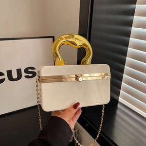 White acrylic evening bag with gold wave handle and chain strap for women