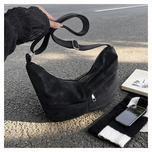 Classic black crescent hobo shoulder bag in soft matte leather for casual autumn commute
