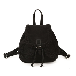 Fashionable black women's backpack with plush faux fur trim and drawstring closure