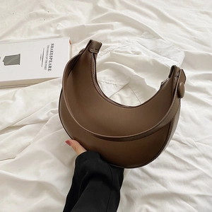 French style dark brown crescent shoulder bag with smooth leather finish and zip closure