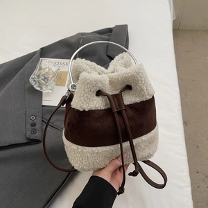 Plush beige faux fur and dark brown suede bucket bag with silver metal ring handles