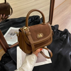 Borsa a tracolla retrò marrone scuro in pelle e camoscio con chiusura a scatto