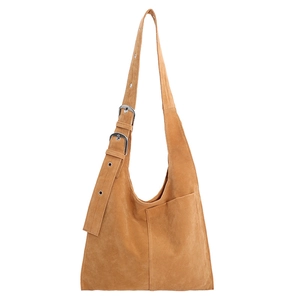 Caramel suede shoulder bag with adjustable strap and vintage minimalist design