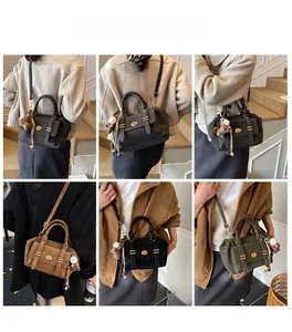 Detail shots of vintage messenger bags showing matte texture and metallic swivel lock clasp