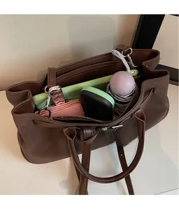 Top view of large capacity tote bag interior showing storage for tablet and essentials