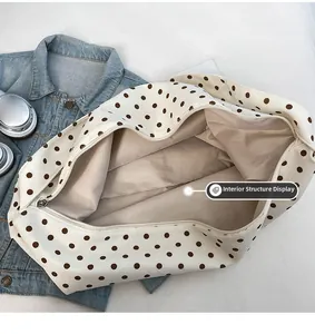 Internal view of large polka dot corduroy tote bag showing spacious lining and zipper