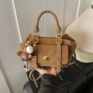 Camel faux leather messenger bag with top handles, crossbody strap, and horse charm