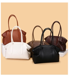 Collection of large capacity leather tote bags in five earthy tones with top handles