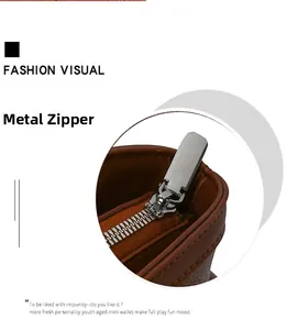 Close-up of premium silver zipper and lychee grain brown leather on a bowling bag