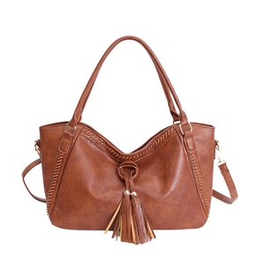 Brown faux leather tote bag with woven stitching and tassels for women fashion