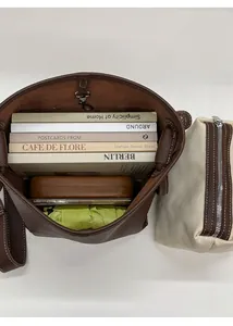 Interior view showing large capacity and inner pouch of the vintage brown bucket bag