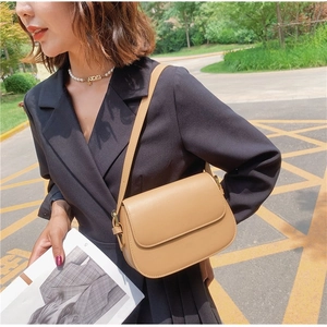 Classic camel faux leather saddle shoulder bag with flap closure for women