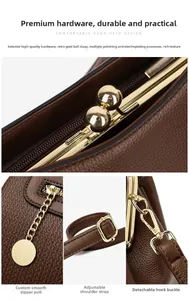 Details der goldenen Magnetkugel-Schließe und Metallbeschläge an der braunen Ledertasche
