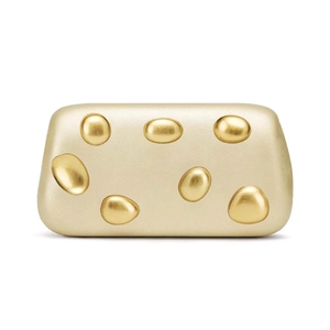 Detailed macro view of matte gold clutch with polished 3D pebble-shaped accents