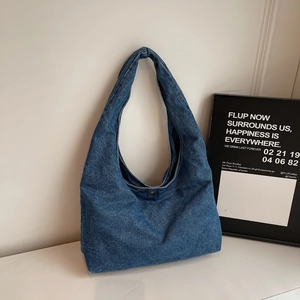 Klassische blaue Denim-Hobo-Tasche mit Retro-Waschung und Kupfer-Druckknopfverschluss