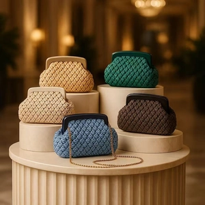 Macro view of woven acrylic clutch bags in multiple colors with metallic clasp