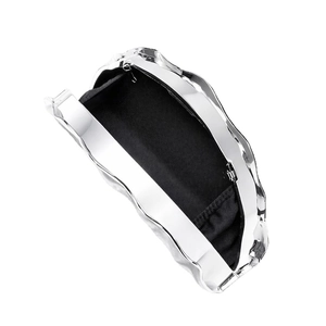 Silver fan-shaped metal clutch bag with a wavy textured mirror finish and black lining