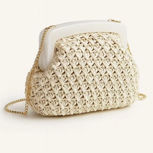 Fashionable woven crossbody clutch bag with acrylic frame and golden chain strap