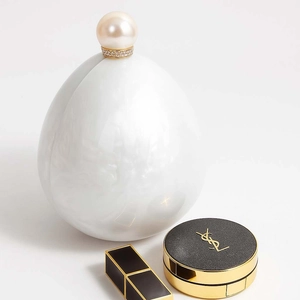 Elegant white pearlescent acrylic evening clutch bag with large pearl rhinestone clasp