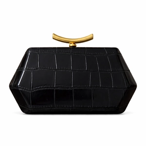 Close-up of black crocodile pattern clutch bag with elegant curved gold metal clasp