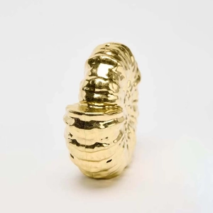 Unique gold snail-shaped clutch bag with luxury spiral texture and metallic finish