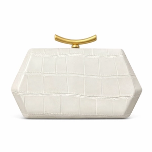 Detail of white hexagonal evening clutch bag with crocodile texture and gold handle