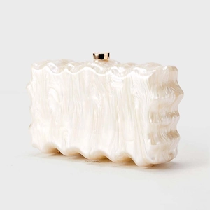Elegant white acrylic clutch bag with pearl luster and wavy texture for wedding parties