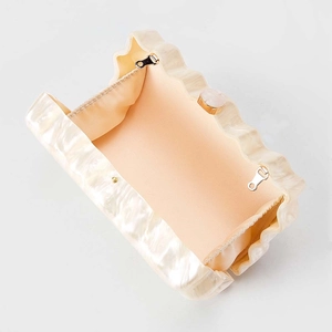 Elegant ivory acrylic evening clutch bag with pearl marble texture and golden hardware