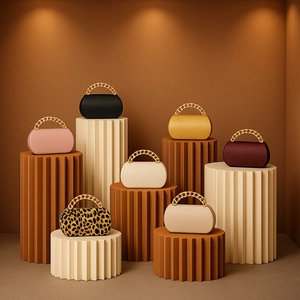 Mini PU leather crossbody bags in various colors featuring chunky gold chain handles