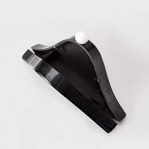 Elegant black marble acrylic clutch bag with large pearl clasp for evening parties