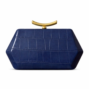 Detailed view of dark blue crocodile pattern evening bag with gold crescent metal buckle