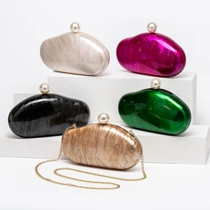 Various acrylic marble clutch bags with pearl clasps and detachable chain straps