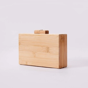 Handmade rectangular bamboo clutch bag with natural wood grain and minimalist clasp