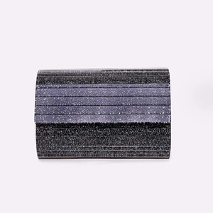 Sparkly acrylic striped evening clutch bag in dark blue and black glitter finish