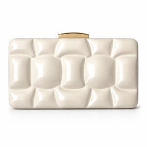 Detailed view of white acrylic clutch with 3D quilted texture and gold metal clasp