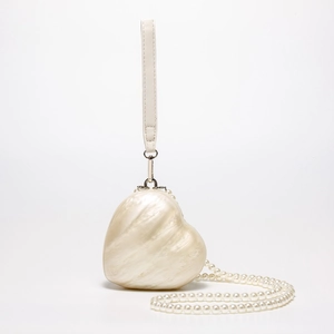 Chic pearlescent heart-shaped acrylic clutch bag with pearl chain and leather wrist strap