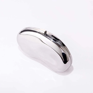 Minimalist silver mirror finish metal evening clutch bag with sleek pod shape and top clasp