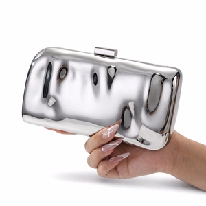 Silver metallic box clutch bag with mirror finish and shoulder strap for evening wear
