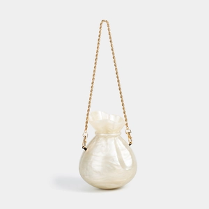 Elegant ivory acrylic purse with mother-of-pearl texture and golden chain strap