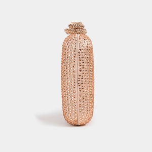 Detail of champagne gold evening clutch with sparkling rhinestones and crystal lock
