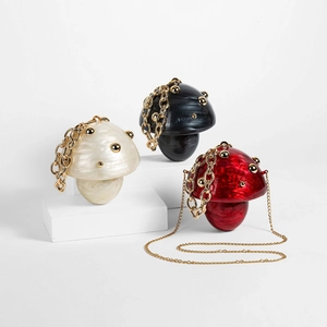Detailed trio of mushroom-shaped acrylic evening clutches in pearl white and marble textures