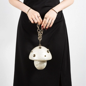 Chic mushroom shaped acrylic handbag in pearlescent cream white with gold chain handle