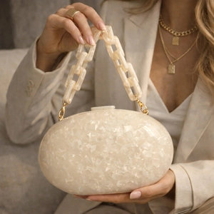Elegant white acrylic evening clutch bag with pearl marble texture and thick chain strap