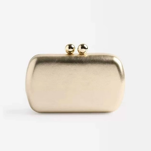 Elegant gold metallic evening clutch bag with double spherical clasp for wedding parties