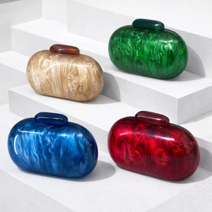 Chic oval acrylic evening clutches with marble patterns in green, yellow, blue, and red