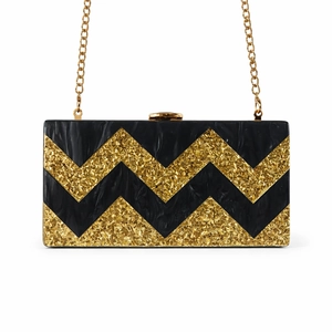 Striped acrylic evening clutch bag with black marble and gold glitter zigzag pattern
