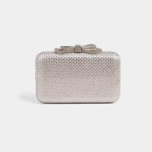 Detail of evening clutch bag featuring silver rhinestones and 3D crystal bow decoration