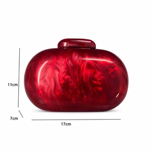 Detail view of red marble acrylic evening clutch bag with precise 17x11x7cm dimensions