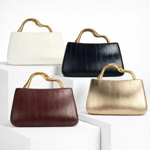 Lizard-embossed PU leather handbags in four colors featuring wavy gold metal handles