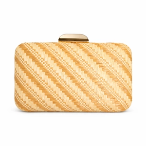 Close-up of natural straw texture and polished gold metal clasp on rectangular clutch bag